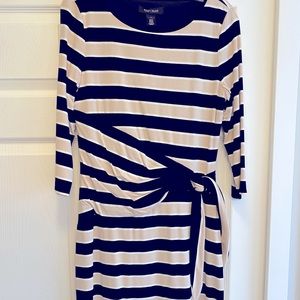 Beautiful faux wrap dress with flattering ruching and side tie. Very flattering